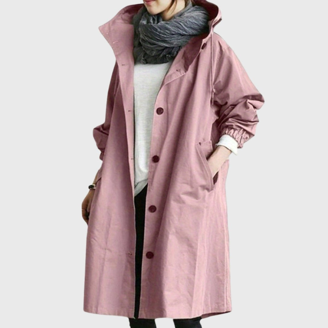 Gabardina comprida impermeável para mulher, com capuz e corte largo. Ideal para outono, moda e proteção contra chuva.