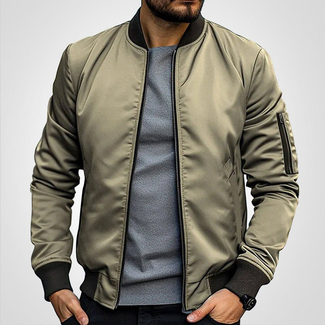 Casaco bomber preto masculino, estilo clássico e casual, perfeito para o outono e inverno urbano.