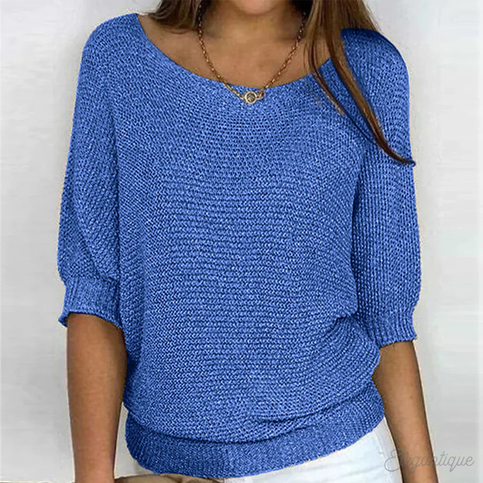 Sweater feminino de malha entrançada, toque suave e elegante, para dias frios com estilo.