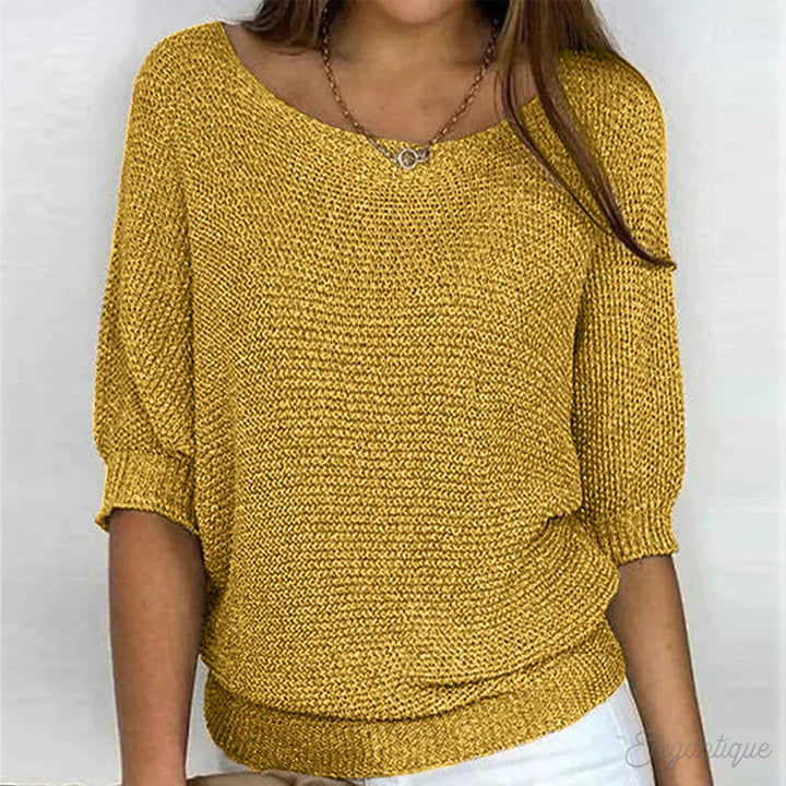Pulôver feminino casual com padrão entrançado, ideal para looks versáteis de manga comprida.
