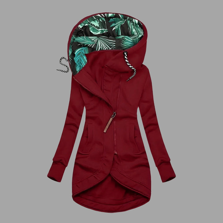 Casaco desportivo feminino elegante, com capuz e fecho éclair, peça essencial de moda feminina para o dia a dia.