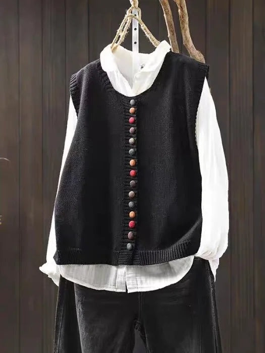 Colete de malha feminino com botões, peça elegante e versátil para moda outono/inverno. Conforto e estilo casual.