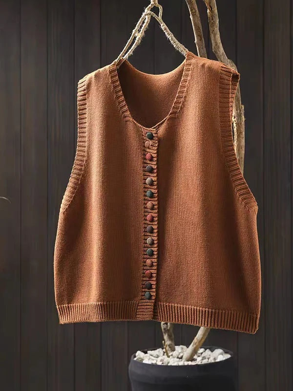 Colete de malha feminino com botões, design moderno para vestuário de outono/inverno. Versátil e fácil de combinar.