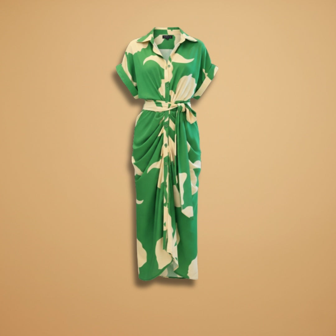 Vestido midi camiseiro feminino estampado tropical, com laço ajustável. Perfeito para o verão casual.