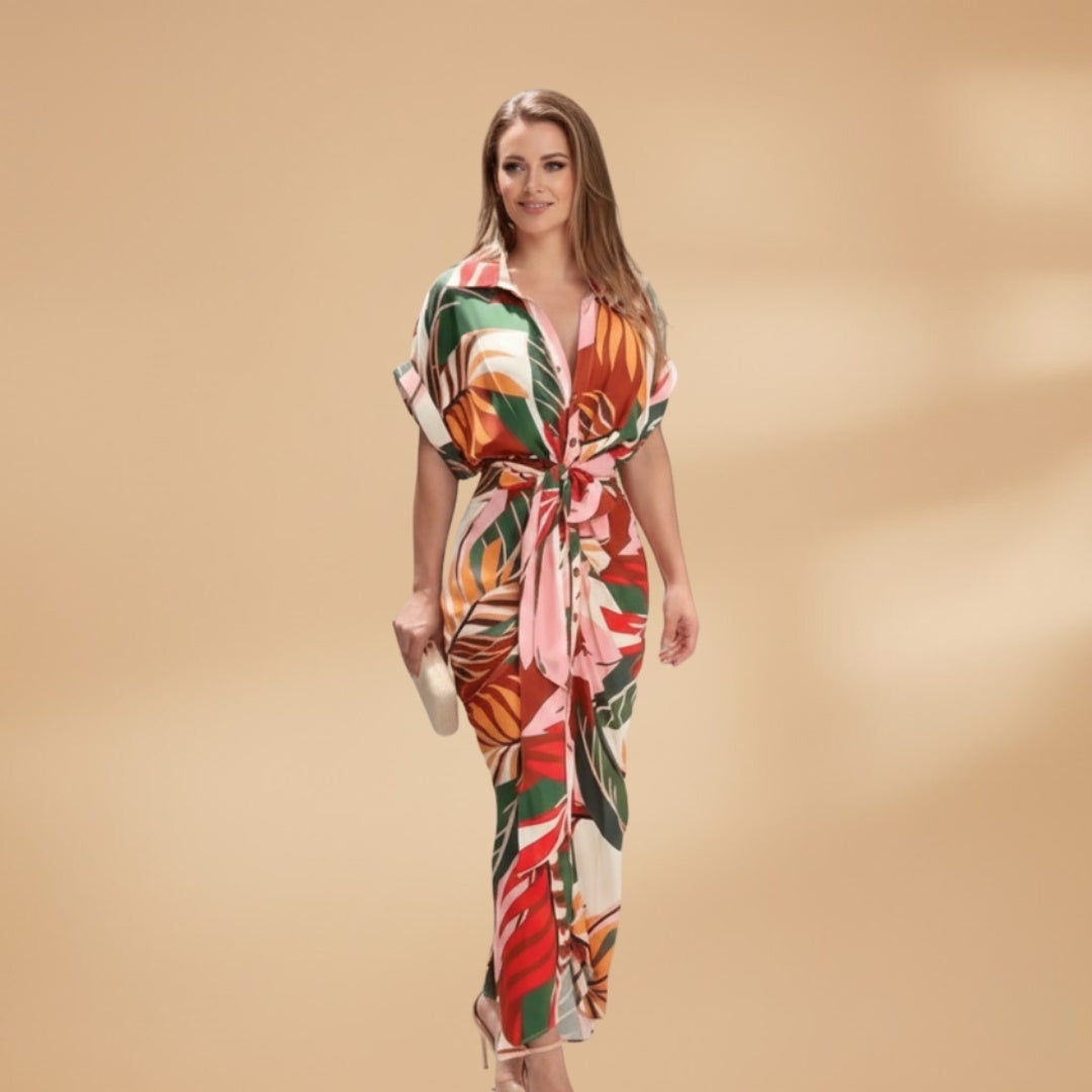 Roupa feminina: Vestido midi camiseiro estampado com laço ajustável. Peça versátil e fresca para o verão.