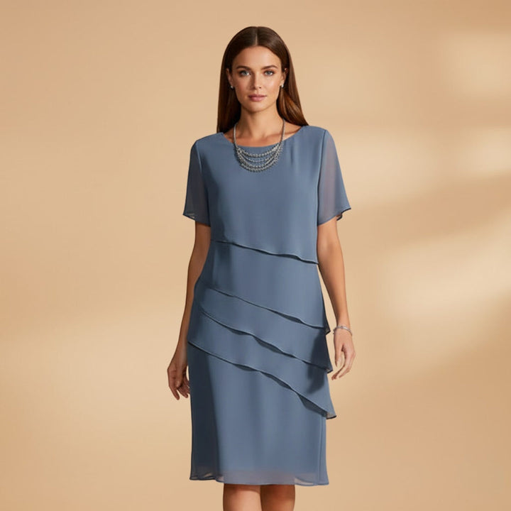 Vestido Midi de festa para mulher, em cor vibrante, com manga curta. Um estilo único e sofisticado.