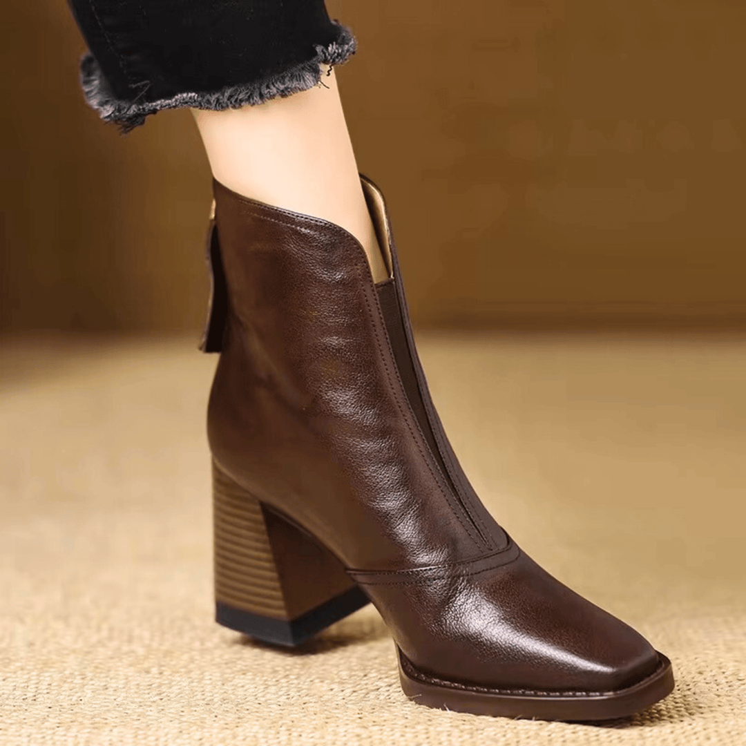 Botins femininos elegantes de tacão médio, ideais para estilo e conforto no outono/inverno.
